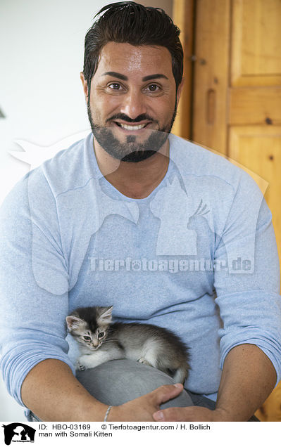 man with Somali Kitten / HBO-03169