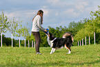 woman with Australian Shepherd