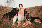 woman and 2 dogs
