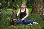 woman and German Shepherd GDR