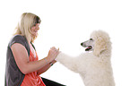 woman with standard poodle