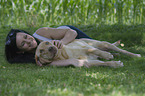 woman and Labrador Retriever