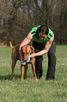 woman with Rhodesian Ridgeback