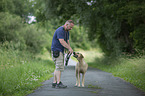 man and Rhodesian Ridgeback