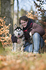 woman and Siberian Husky
