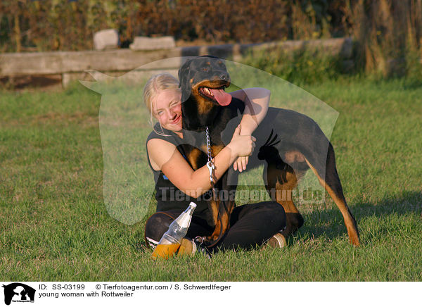 young woman with Rottweiler / SS-03199
