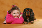 girl with King Charles Spaniel