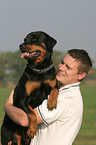 man with Rottweiler