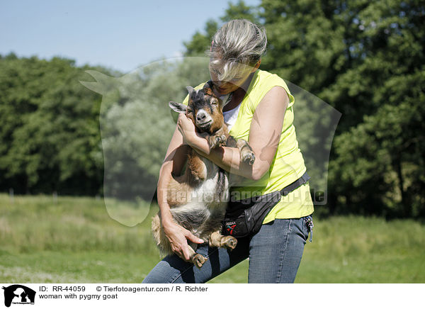 woman with pygmy goat / RR-44059