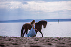 woman and Andalusian Horse