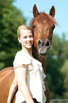 woman and arabian horse