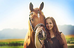 woman and arabian horse