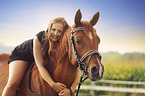 woman and arabian horse