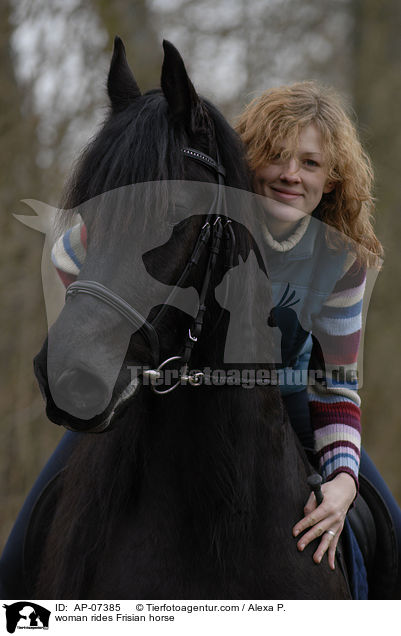 woman rides Frisian horse / AP-07385