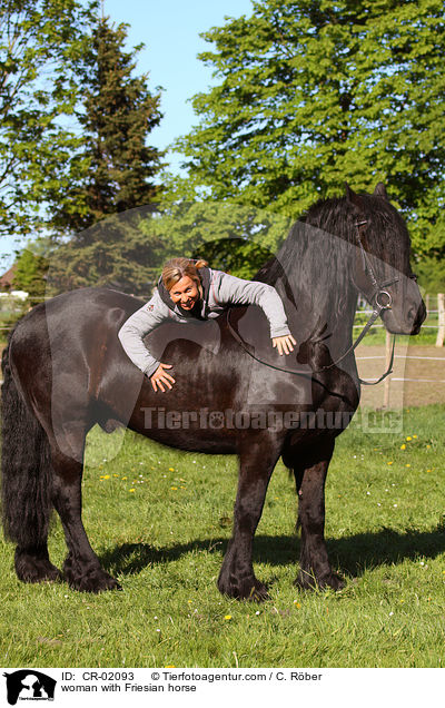 woman with Friesian horse / CR-02093
