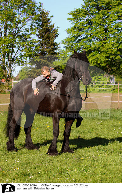 woman with Friesian horse / CR-02094