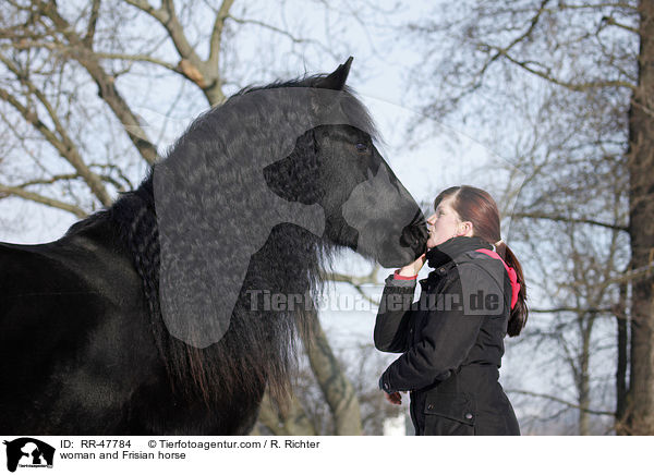 woman and Frisian horse / RR-47784