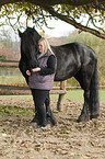 womn with Frisian horse