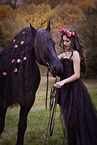 young woman with Frisian Horse