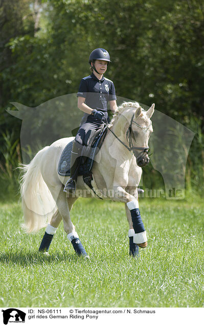 girl rides German Riding Pony / NS-06111