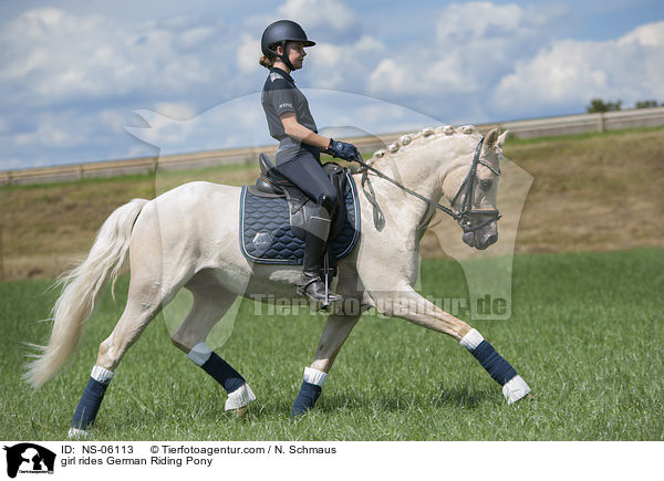 girl rides German Riding Pony / NS-06113