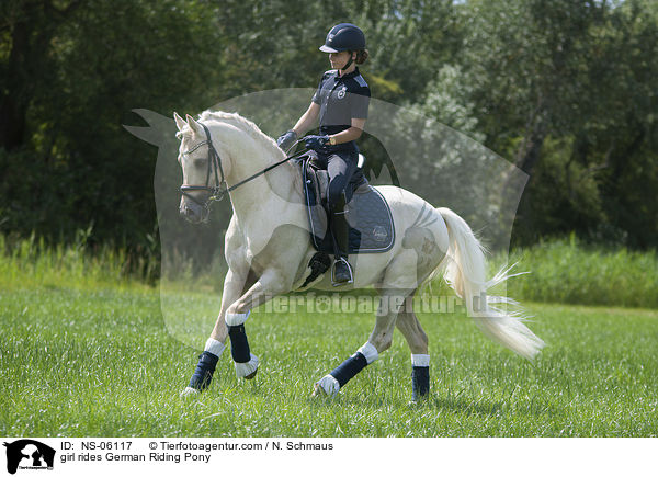 girl rides German Riding Pony / NS-06117