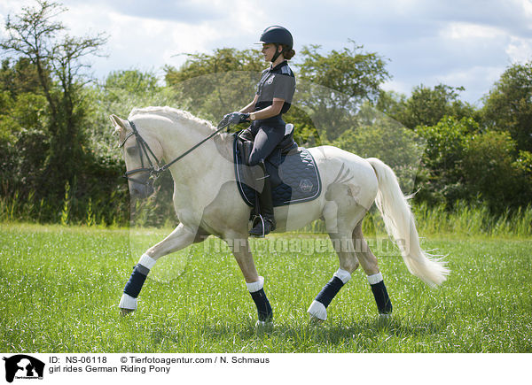 girl rides German Riding Pony / NS-06118