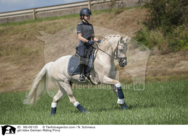 girl rides German Riding Pony / NS-06120