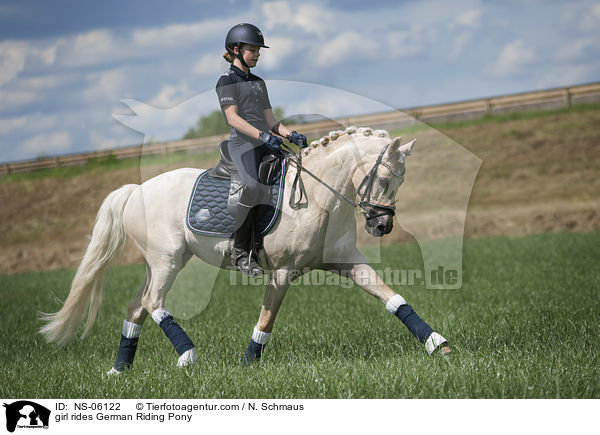 girl rides German Riding Pony / NS-06122