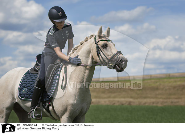 girl rides German Riding Pony / NS-06124