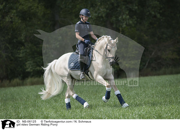 girl rides German Riding Pony / NS-06125