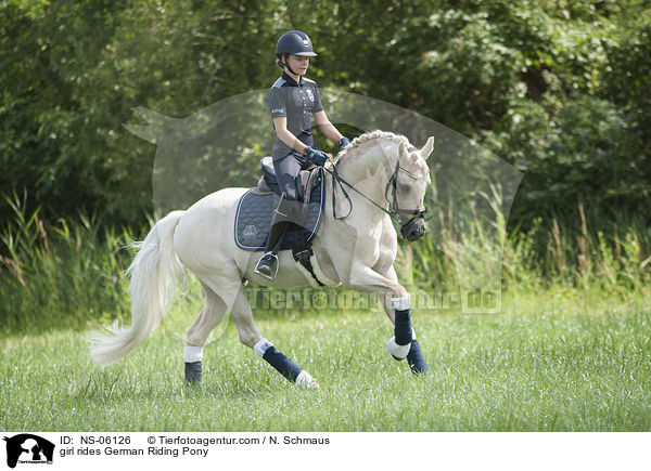 girl rides German Riding Pony / NS-06126