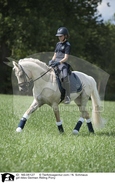 girl rides German Riding Pony / NS-06127