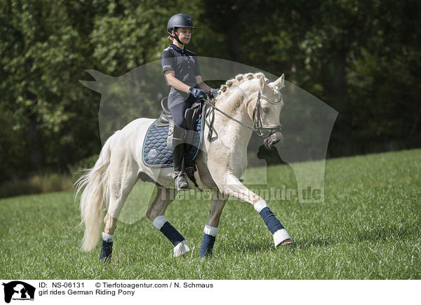 girl rides German Riding Pony / NS-06131