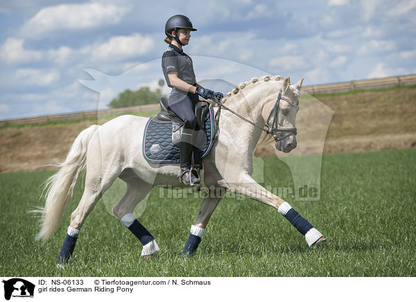 girl rides German Riding Pony / NS-06133