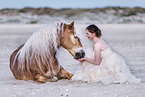 woman and Haflinger horse