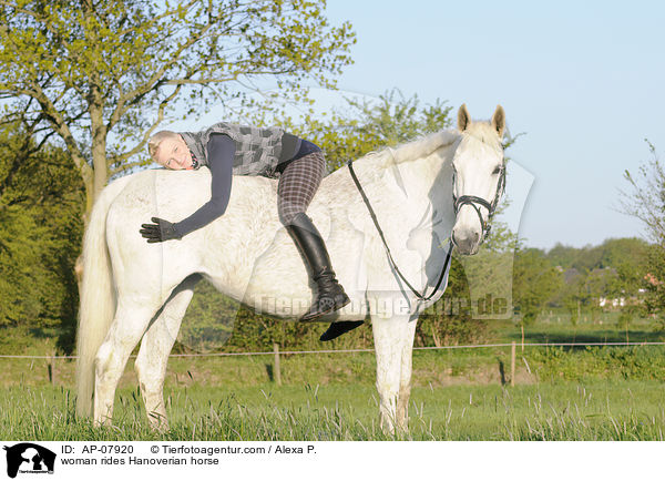 woman rides Hanoverian horse / AP-07920