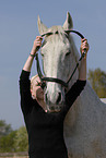 woman with Hanoverian horse