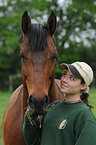 woman with Hannoveraner horse