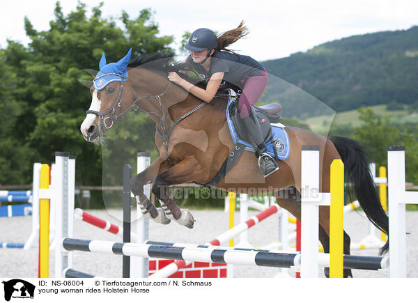 young woman rides Holstein Horse / NS-06004