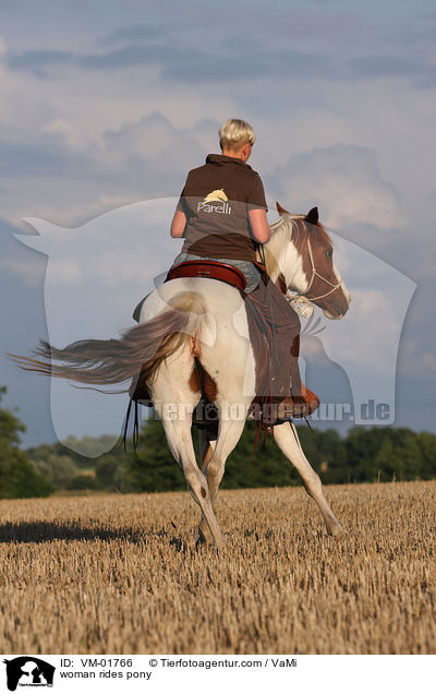 woman rides pony / VM-01766
