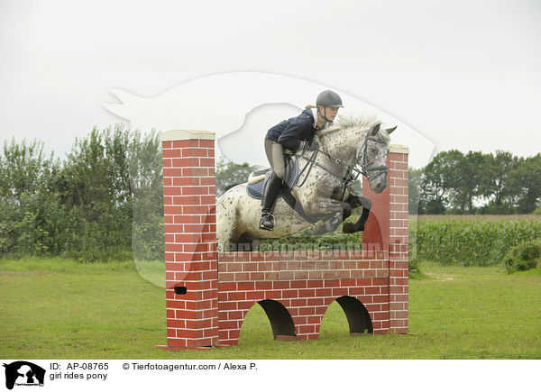 girl rides pony / AP-08765