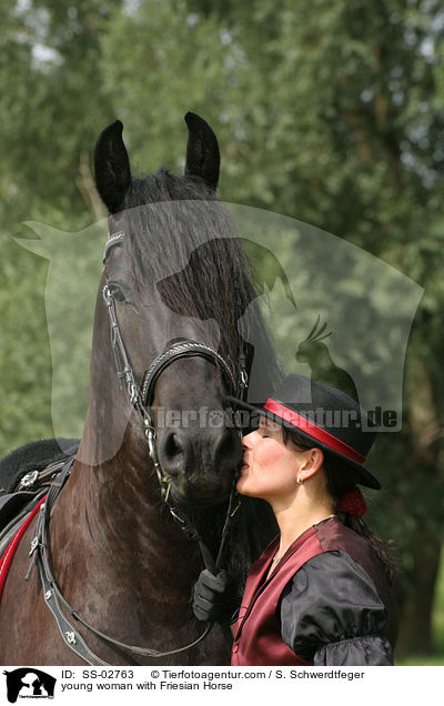 young woman with Friesian Horse / SS-02763