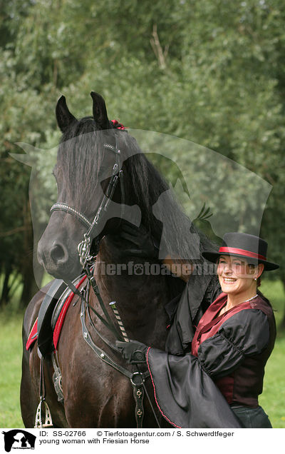 young woman with Friesian Horse / SS-02766