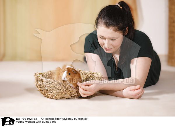 young woman with guinea pig / RR-102183