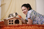 young woman with guinea pig