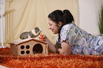 young woman with guinea pig